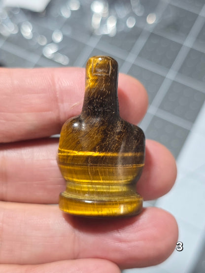 #3 - 1.5" Tiger Eye Middle Finger Gesture