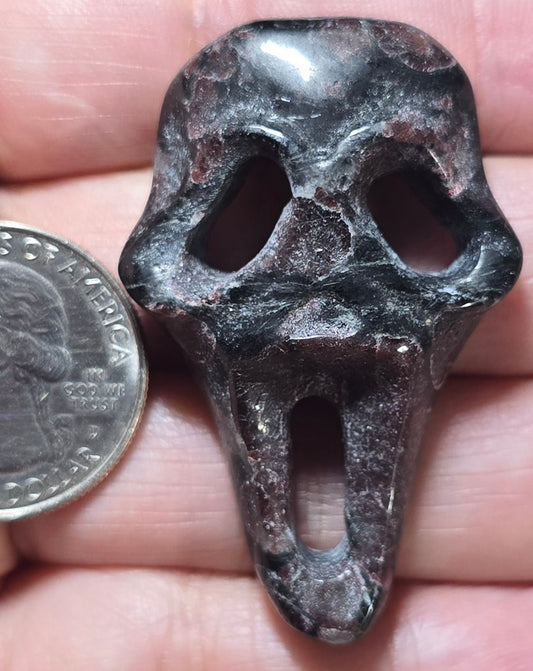 Garnet Silent Scream Face Carving